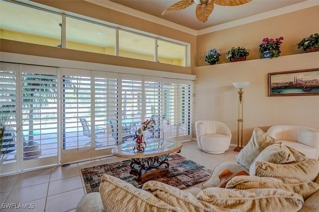 living room with ceiling fan, tile patterned floors, and crown molding