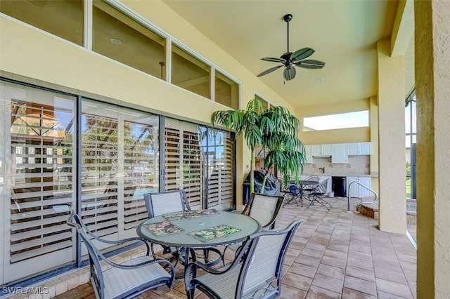 view of patio / terrace featuring ceiling fan