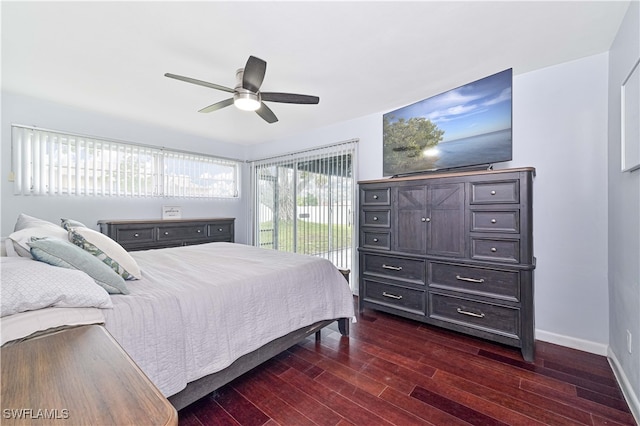 bedroom featuring ceiling fan, access to outside, and dark hardwood / wood-style flooring