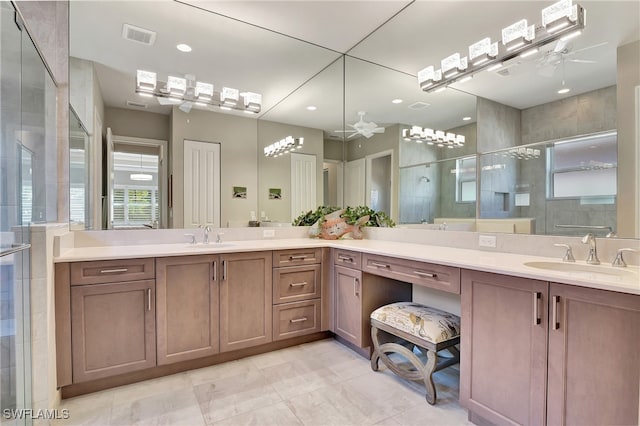 bathroom featuring vanity, ceiling fan, tile patterned floors, and a shower with door