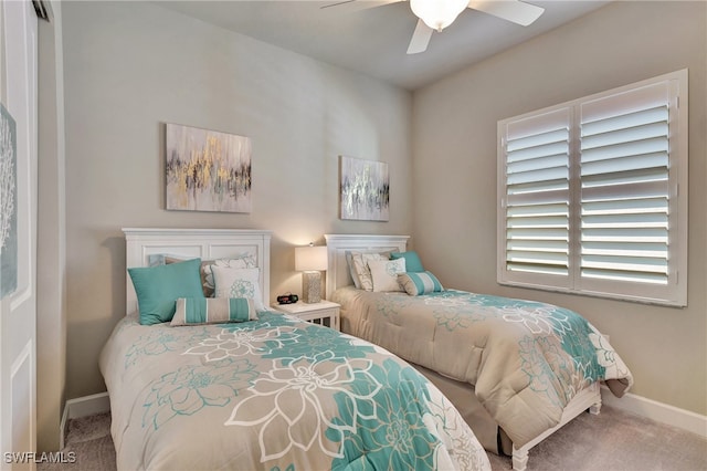 bedroom with ceiling fan and carpet