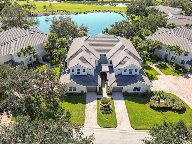 drone / aerial view with a water view