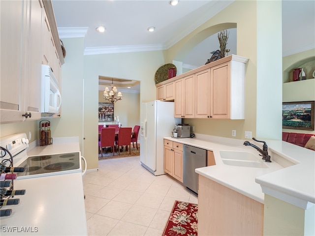 kitchen featuring sink, an inviting chandelier, white appliances, light tile patterned floors, and ornamental molding