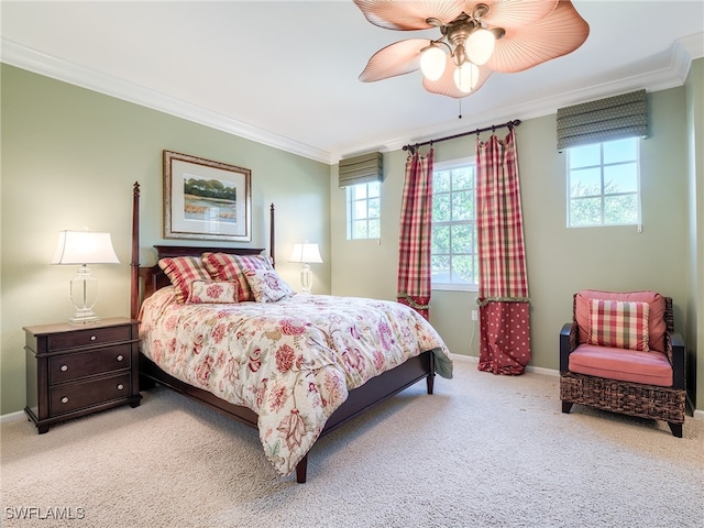 bedroom featuring ceiling fan, light carpet, and ornamental molding