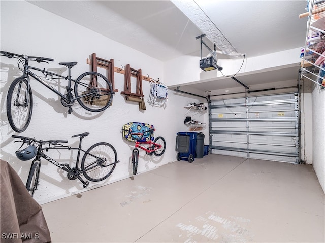 garage featuring a garage door opener