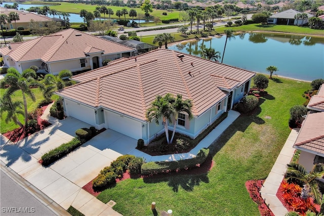 bird's eye view with a water view