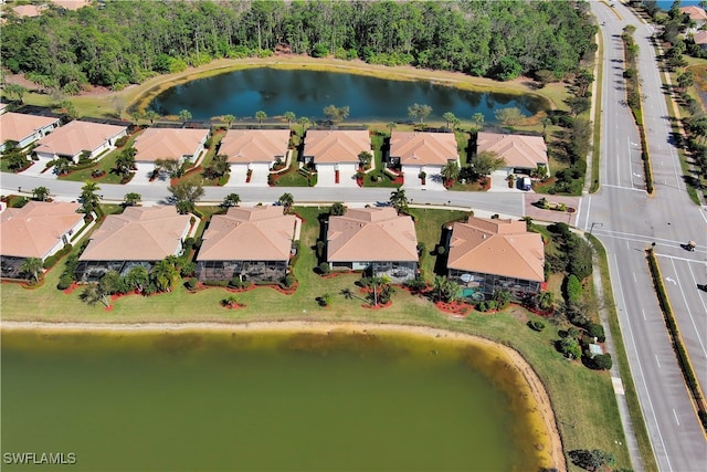 bird's eye view with a water view