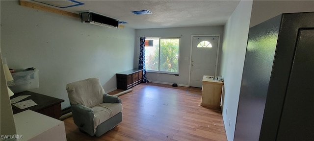 entryway with light hardwood / wood-style flooring