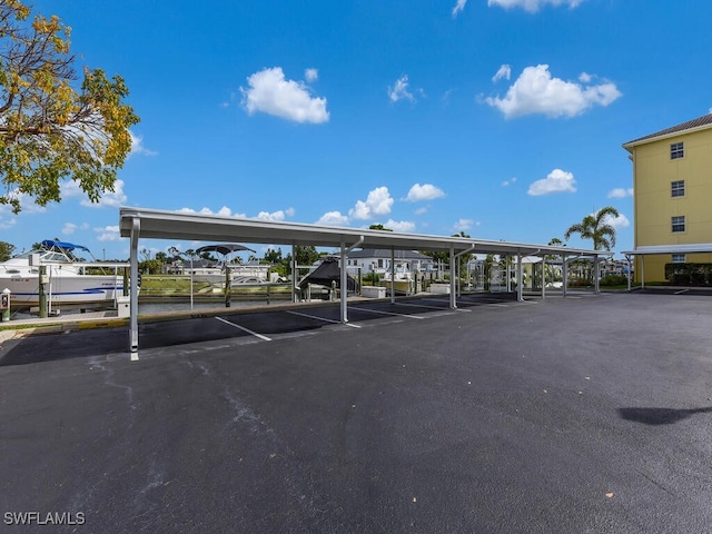 view of parking with a carport