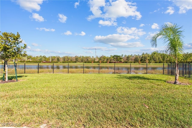 view of yard with a water view