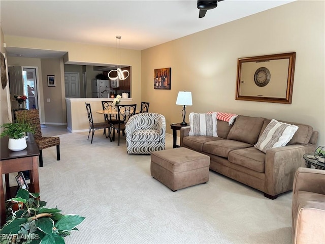 living room featuring light carpet