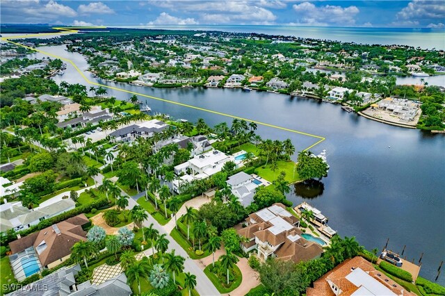 bird's eye view with a water view