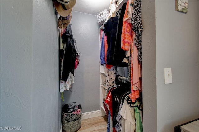 113 SE 41st St, Cape Coral, FL 33904 - walk in closet featuring light wood-type flooring