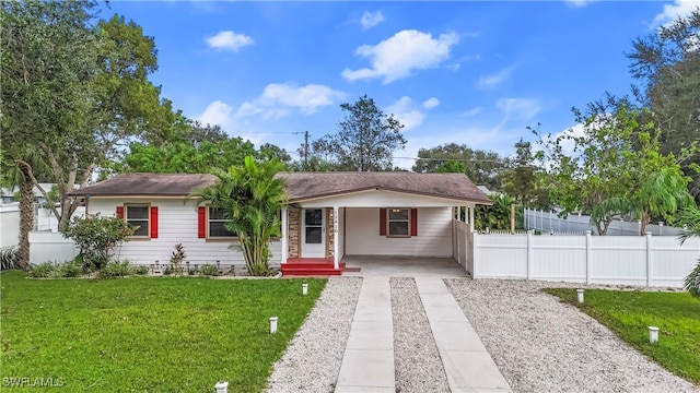 view of front of house featuring a porch and a front yard