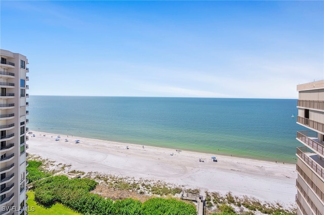 property view of water featuring a beach view