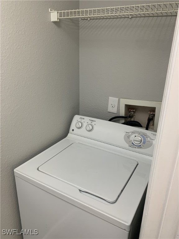 laundry area featuring washer / dryer