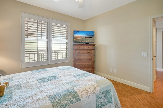 bedroom featuring ceiling fan and light hardwood / wood-style flooring