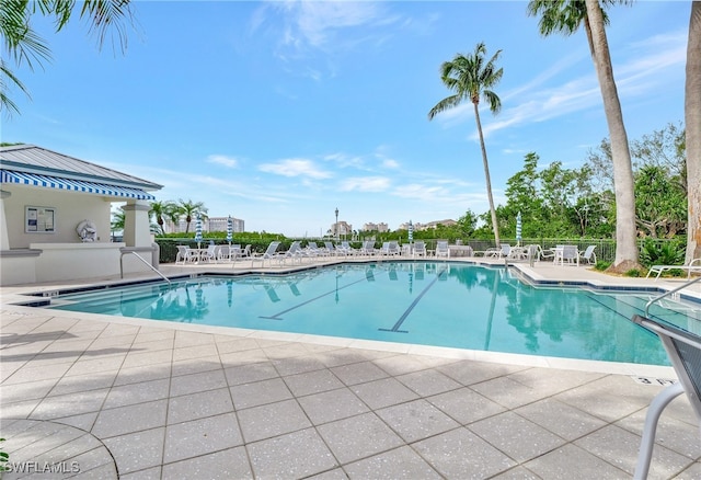 view of pool featuring a patio area