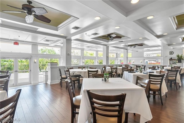 dining area featuring ceiling fan, coffered ceiling, beam ceiling, dark wood-type flooring, and french doors