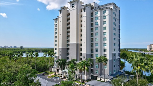 view of property with a water view