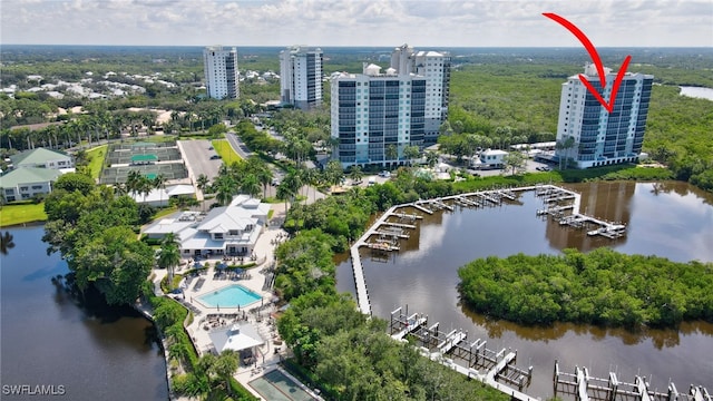 birds eye view of property featuring a water view