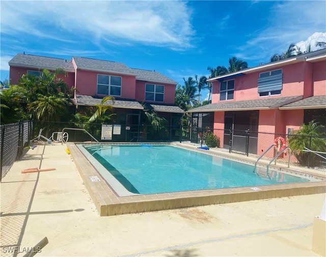 view of swimming pool featuring a patio