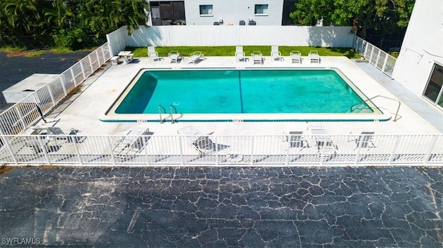 view of swimming pool featuring a patio