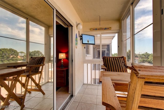 sunroom / solarium featuring plenty of natural light