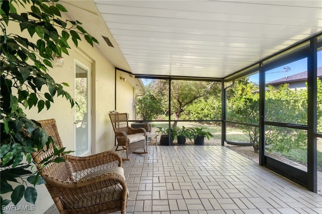 sunroom featuring a wealth of natural light