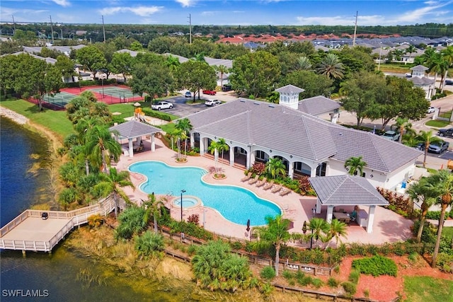 birds eye view of property featuring a water view