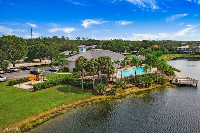 birds eye view of property featuring a water view