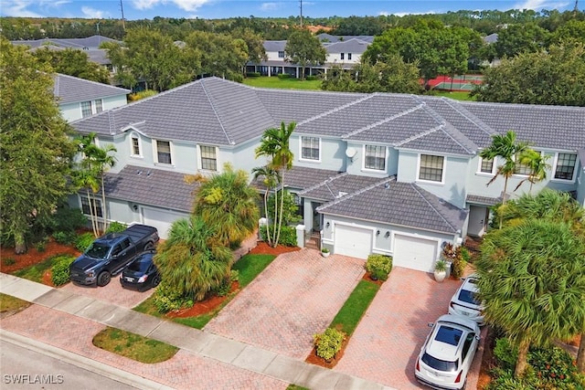 birds eye view of property with a residential view