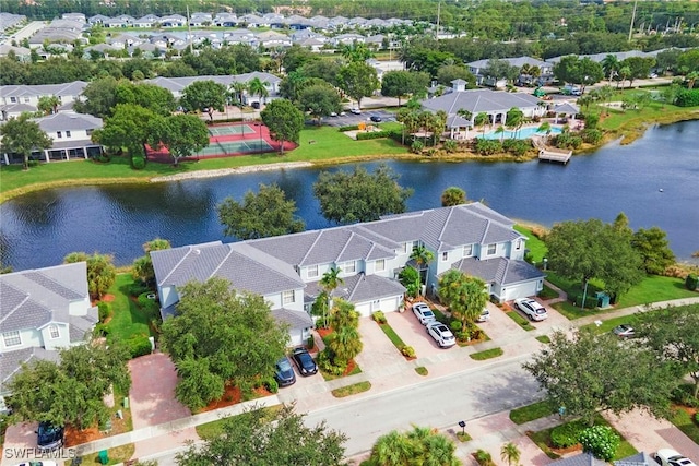 14776 Pinnacle Pl Unit 62, Naples, FL 34119 - aerial perspective of suburban area with a nearby body of water