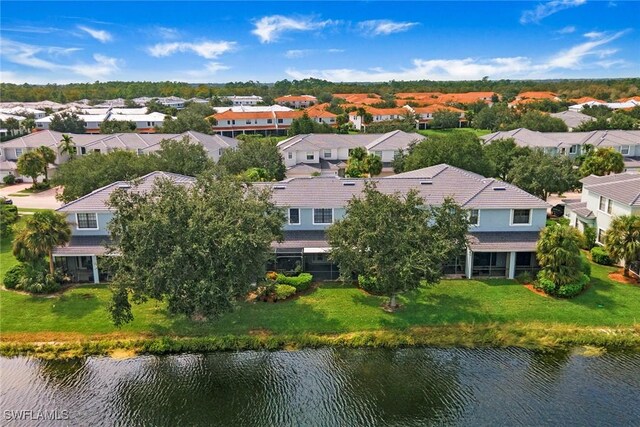 14776 Pinnacle Pl Unit 62, Naples, FL 34119 - aerial perspective of suburban area with a nearby body of water