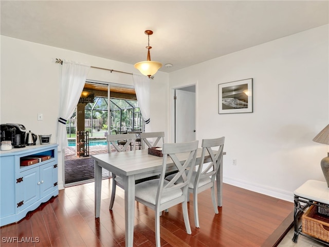 dining room featuring dark hardwood / wood-style floors