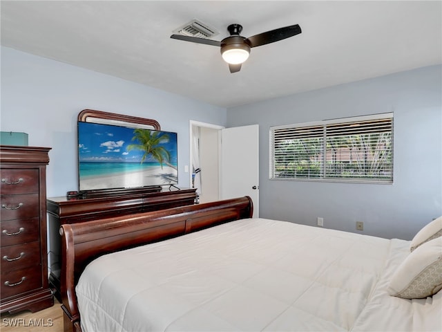 bedroom featuring ceiling fan and light wood-type flooring