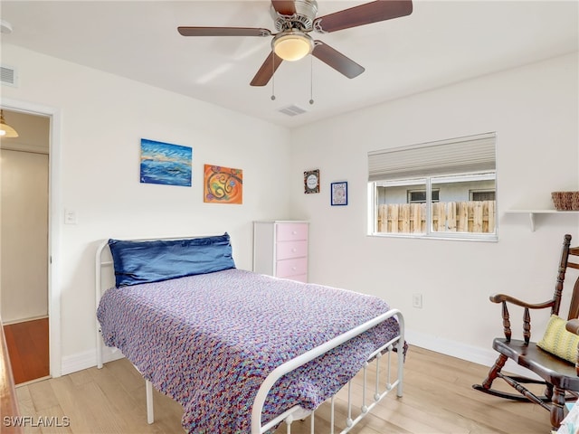 bedroom featuring ceiling fan and light wood-type flooring