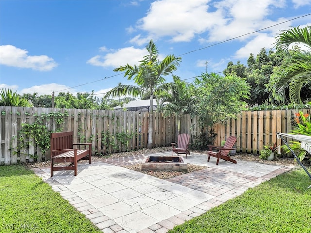 view of patio featuring an outdoor fire pit