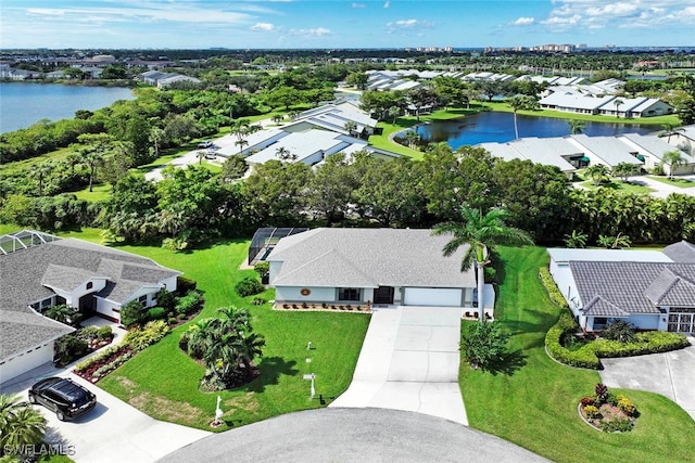 bird's eye view with a water view