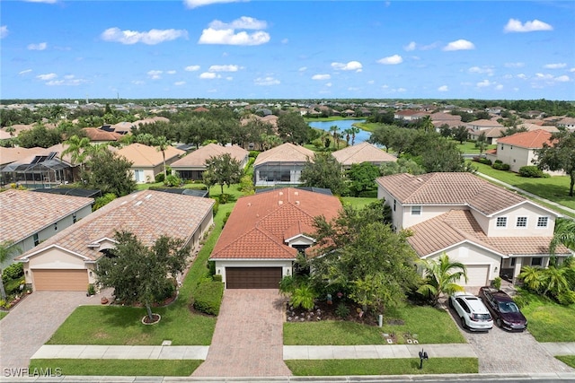 drone / aerial view with a water view