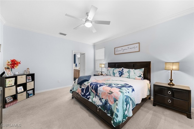 bedroom with light carpet, ensuite bath, ceiling fan, and crown molding