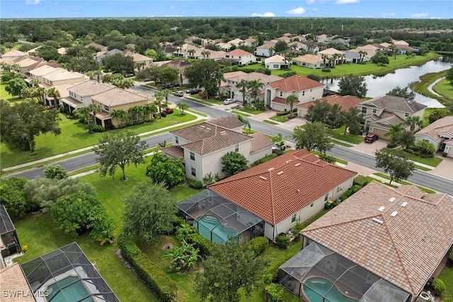 drone / aerial view with a water view