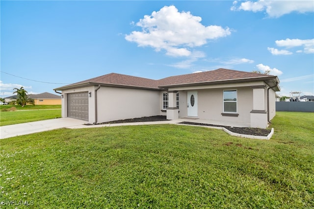 ranch-style house with a front yard and a garage