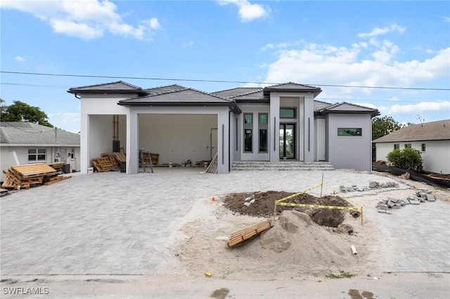 view of front of property featuring stucco siding