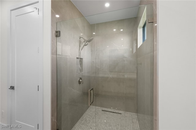 bathroom with an enclosed shower