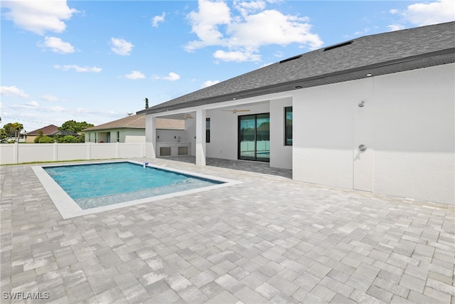 view of pool featuring a patio and ceiling fan