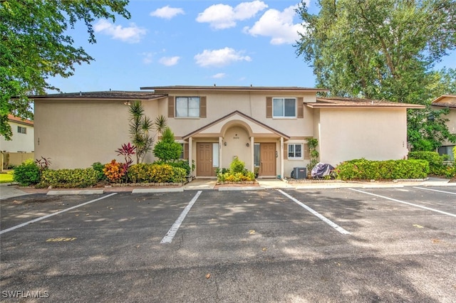 view of front of property with central AC unit