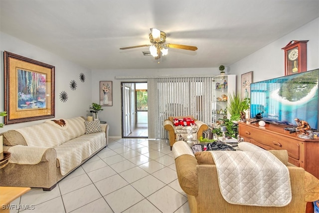 living room featuring ceiling fan and light tile patterned flooring