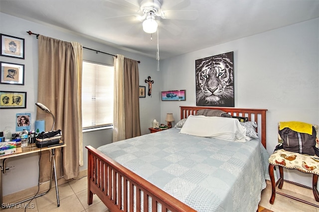 bedroom with light tile patterned floors and ceiling fan