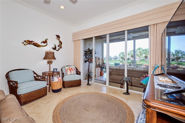 sitting room featuring ornamental molding